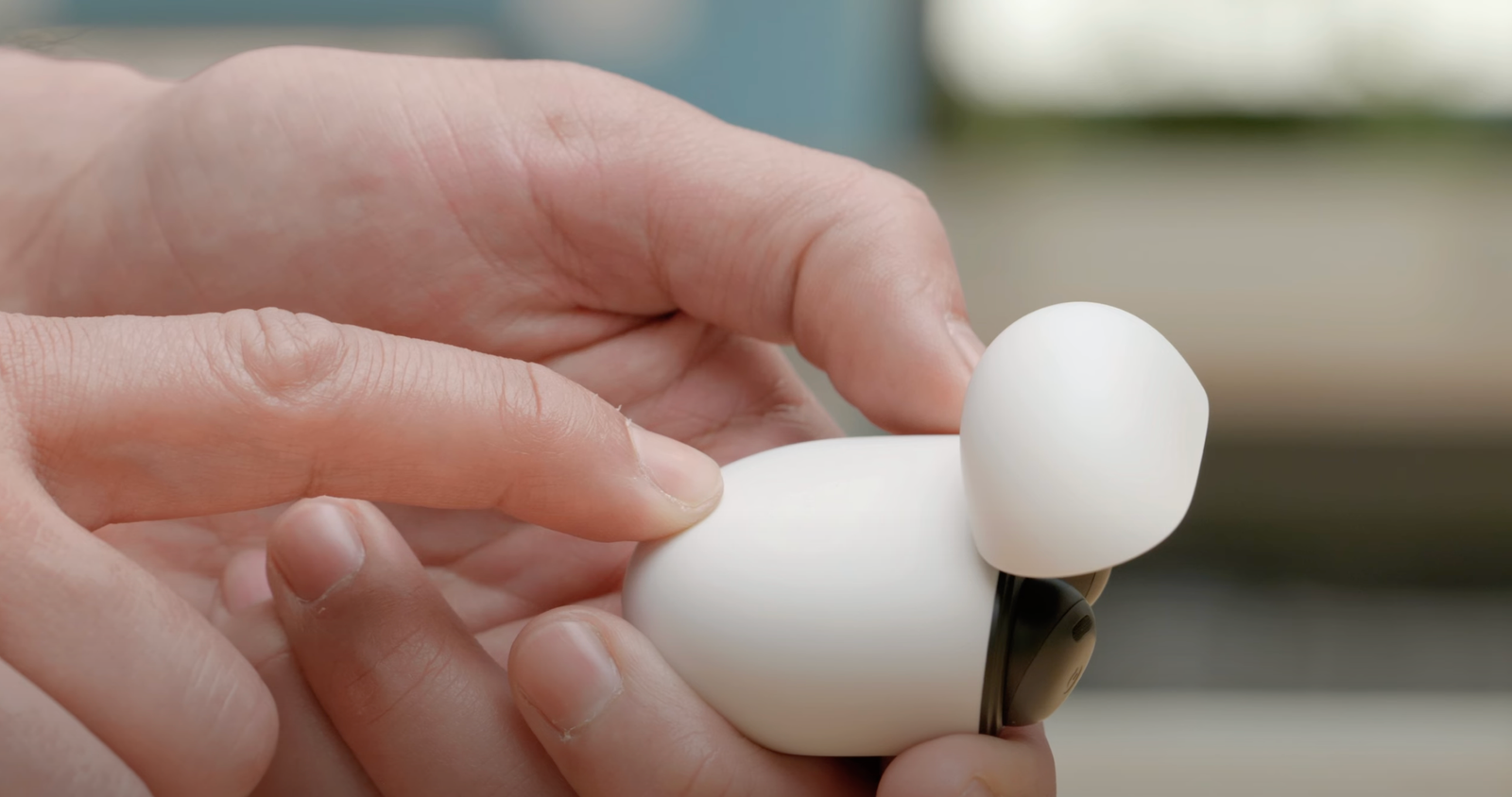 Hold down pairing button on the back of the Pixel Buds Pro charging case