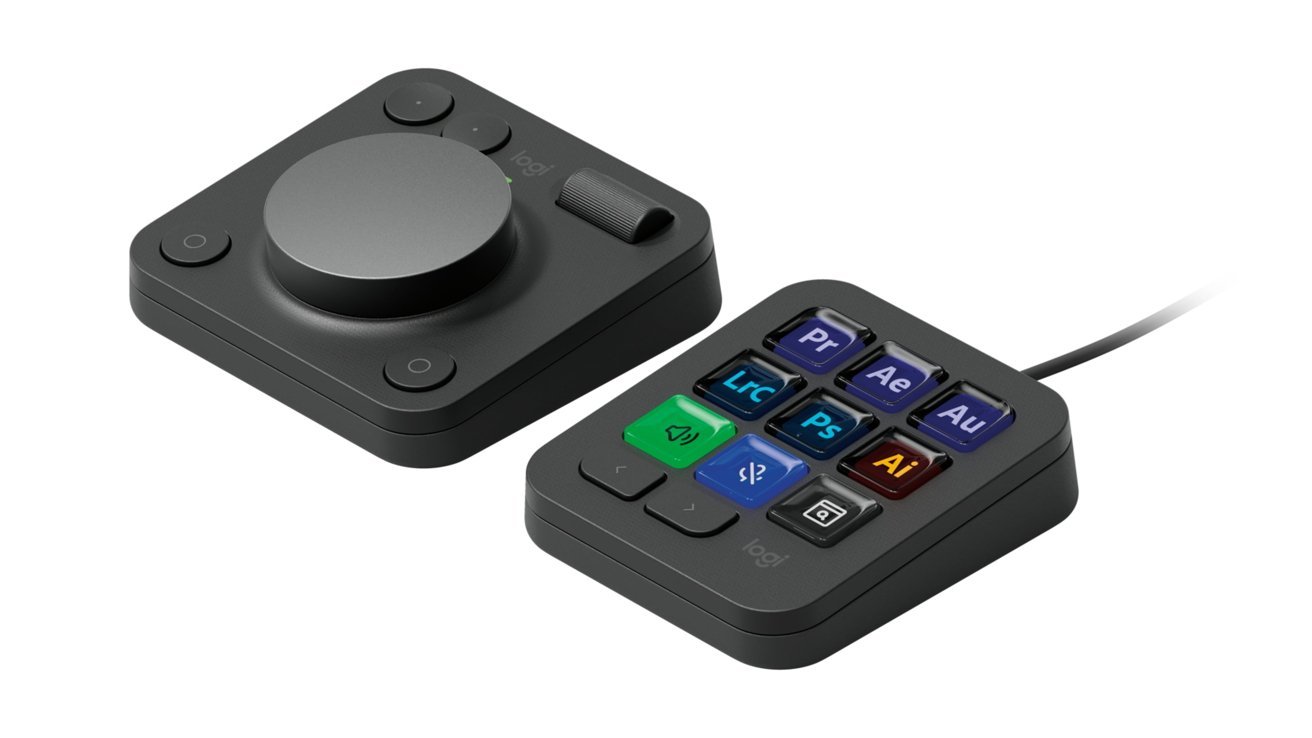 Two control pads, one with buttons and knobs, the other with software shortcut keys and a cable.