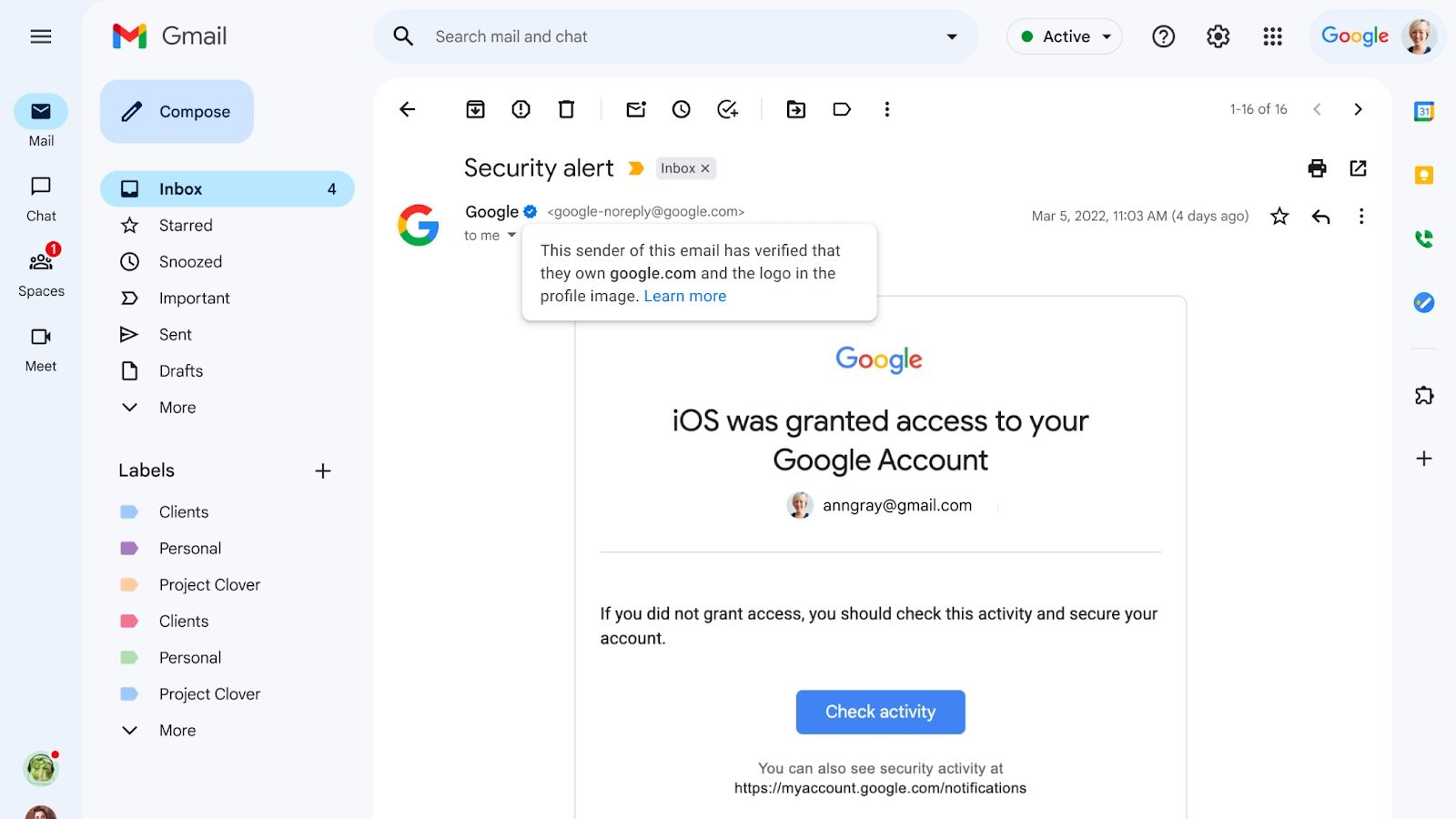 An example Gmail email showing a blue checkmark next to a sender. A cursor hovers over the checkmark, generating a box that says ' this sender of email has verified that they own google.com and the logo in profile image.