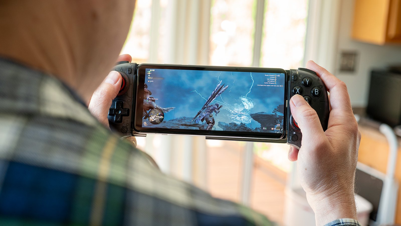 Playing Monster Hunter Wilds through GeForce Now on a OnePlus 13 with a Viture x 8BitDo Ultimate Mobile Controller