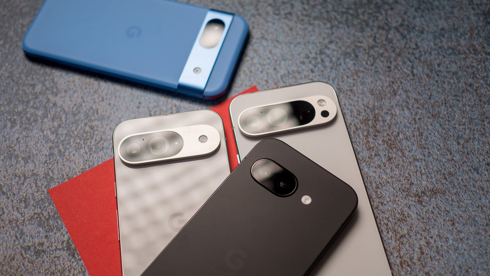 Google Pixel 9a camera island next to Pixel 9, 9 Pro, and 8a