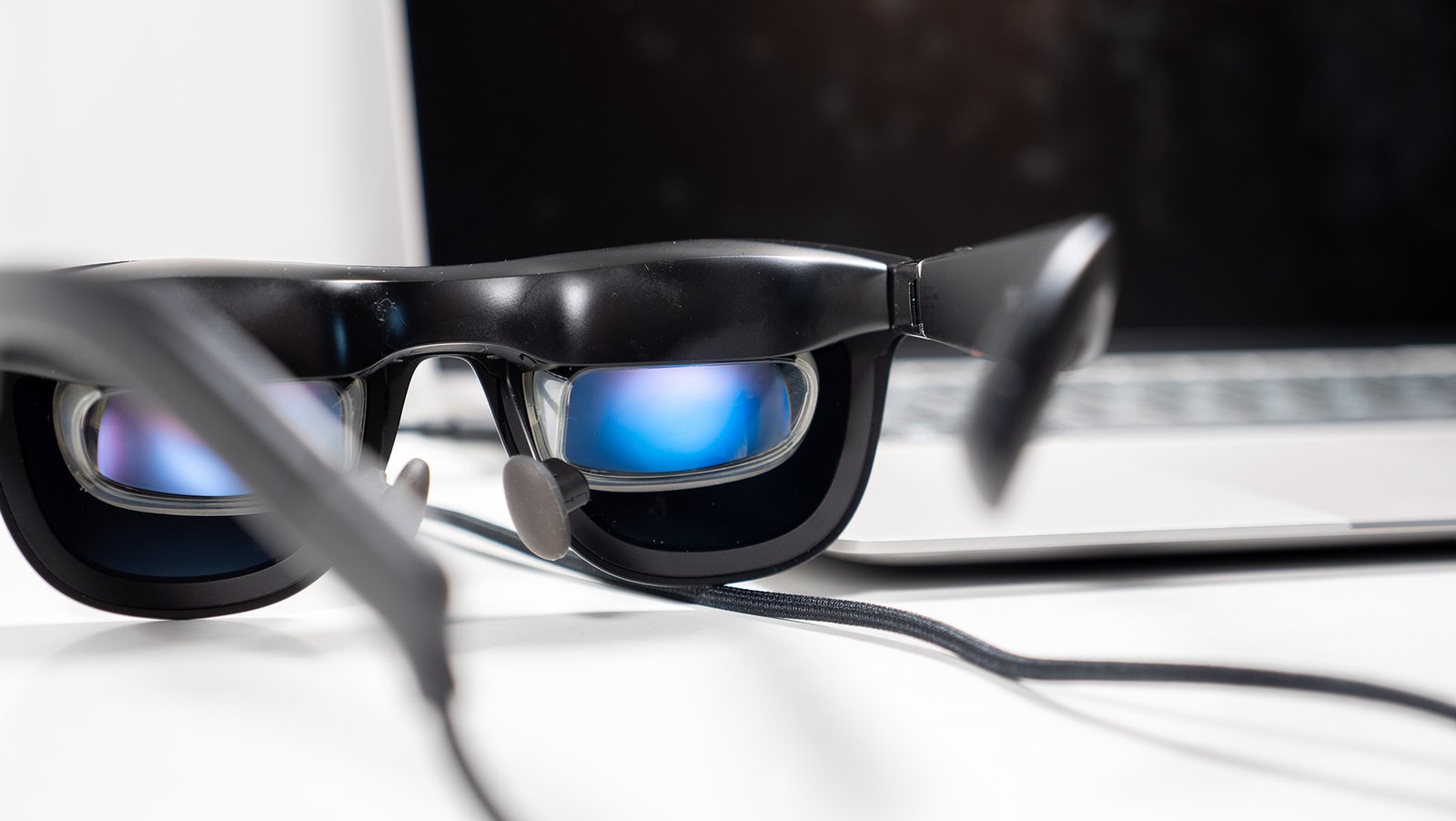 Xreal One smart display glasses showing a Windows desktop on its displays