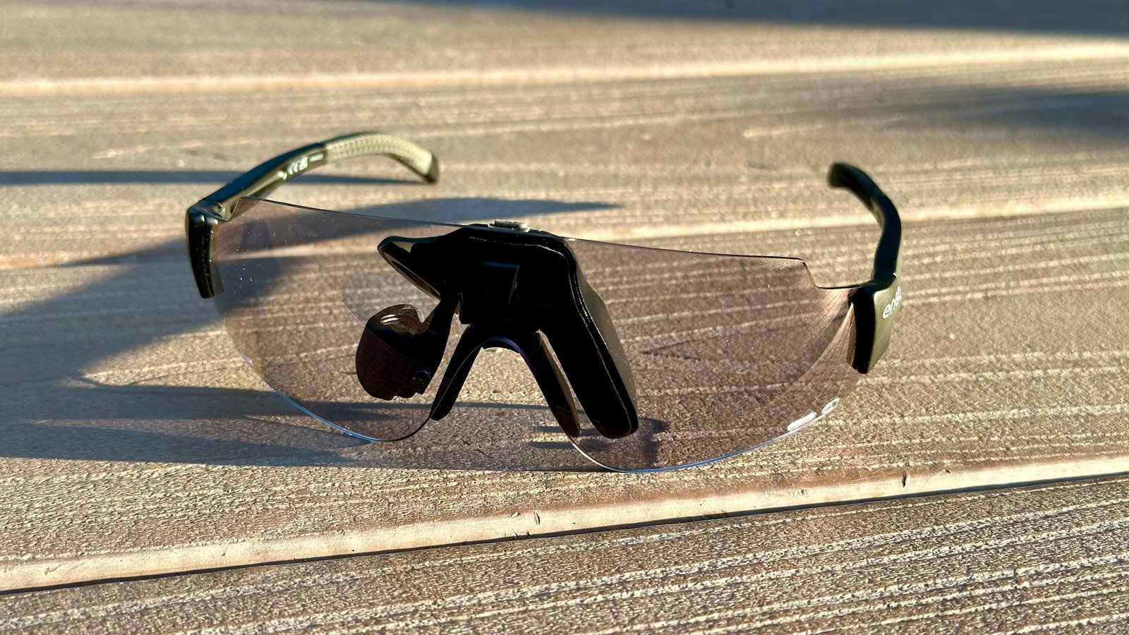 ENGO 2 AR glasses displayed on a deck at a front-left-facing angle.