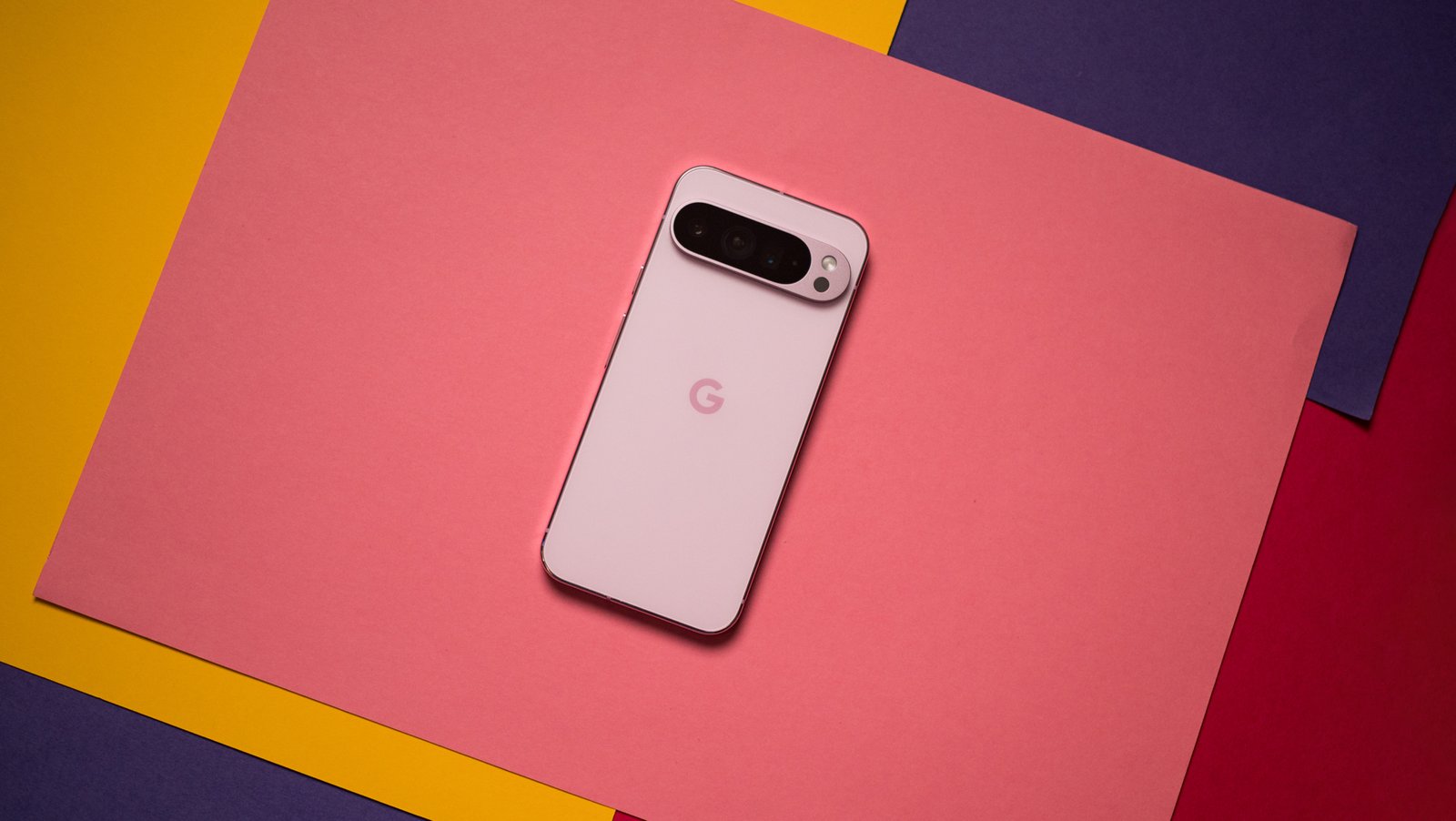 Pixel 9 Pro XL back view against colorful background